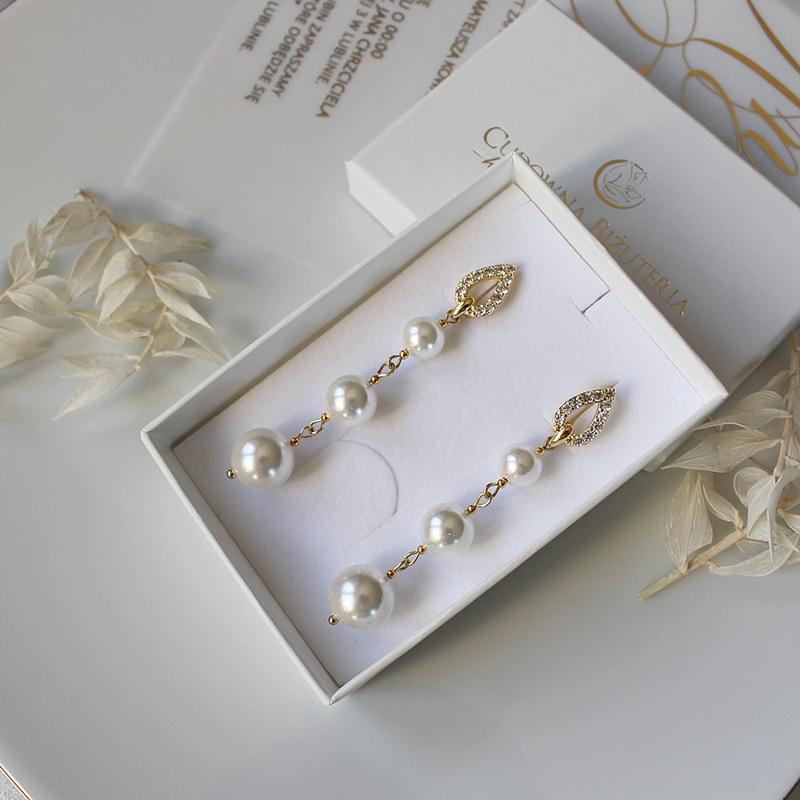 Jakie kolczyki do sukni ślubnej wybrać, by olśnić w tym wyjątkowym dniu?